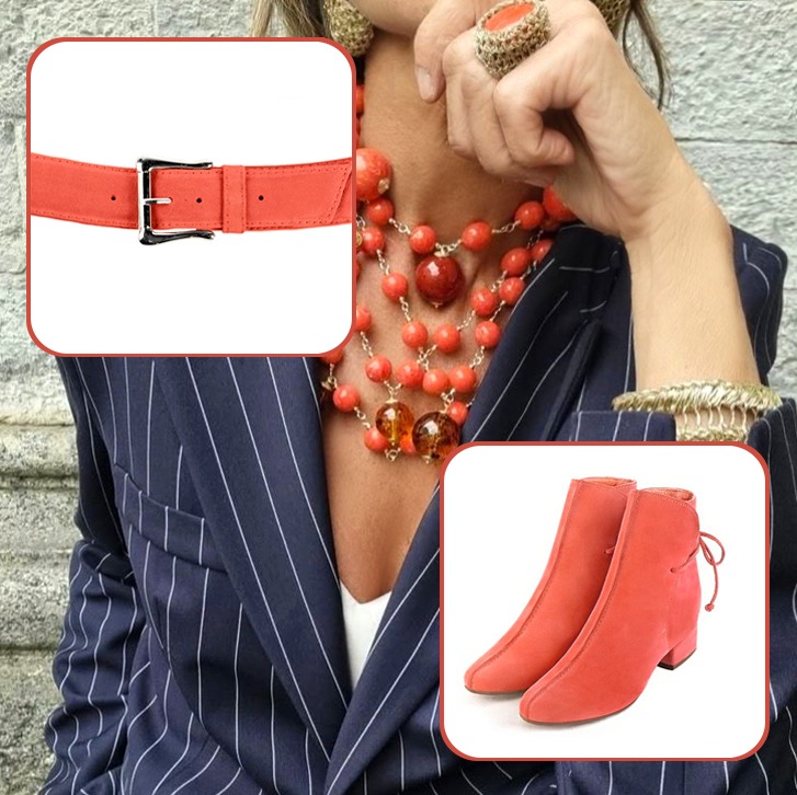 Women's dress ankle boots back laces and custom-made belt paired to a coral and clementine orange outfit.