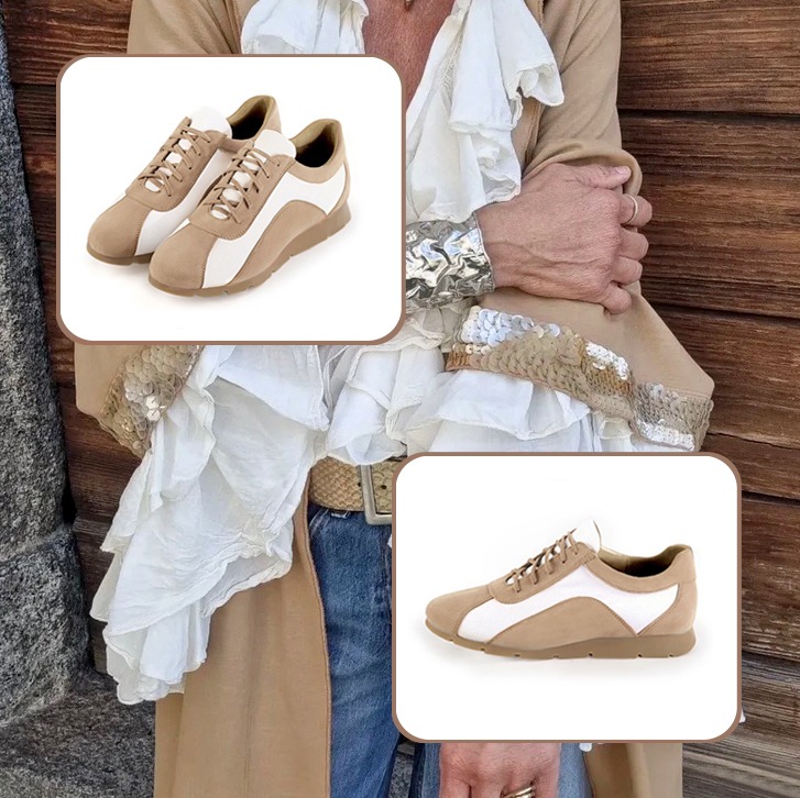 Women's elegant urban sneakers and medium luxurious handbag to pair with a tan beige and off white outfit.