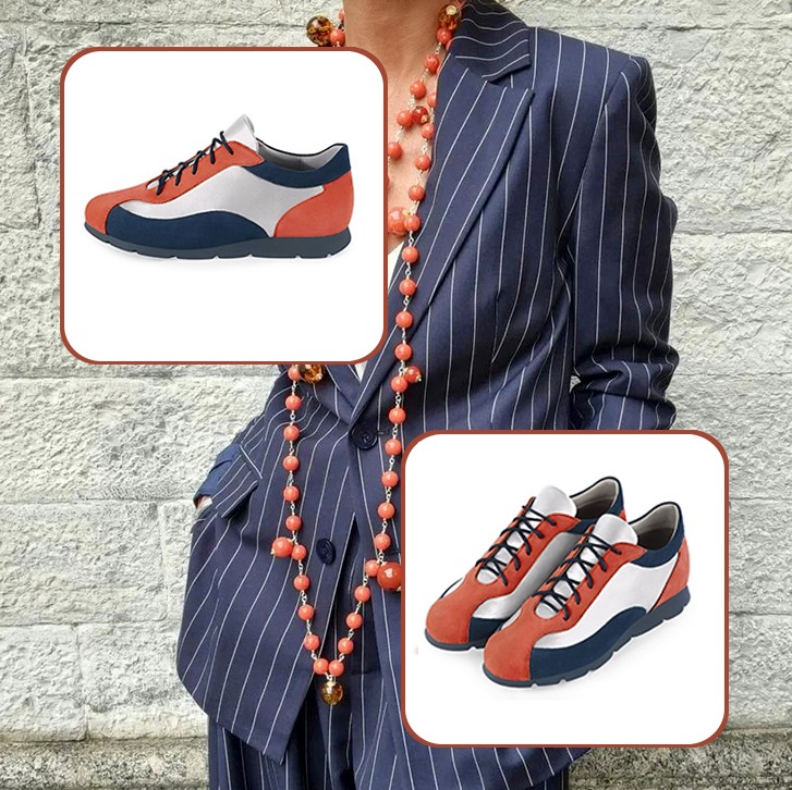 Women's custom-made belt and elegant urban sneakers to pair with a terracotta orange, silver and navy blue outfit.