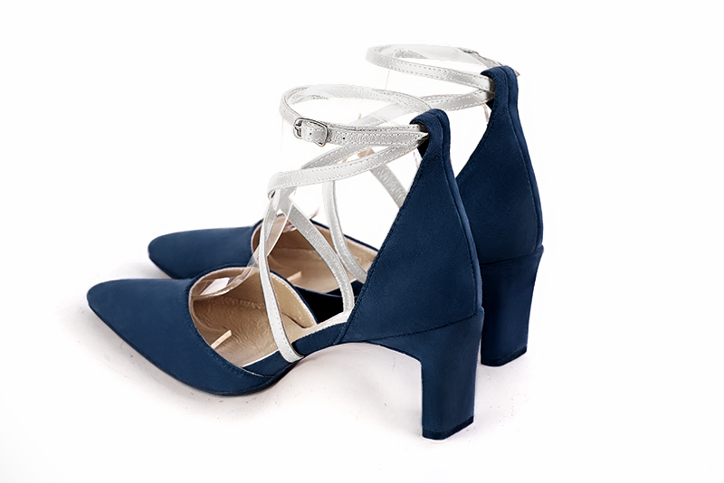Navy blue and light silver women's open side shoes, with crossed straps. Tapered toe. Medium comma heels. Rear view - Florence KOOIJMAN