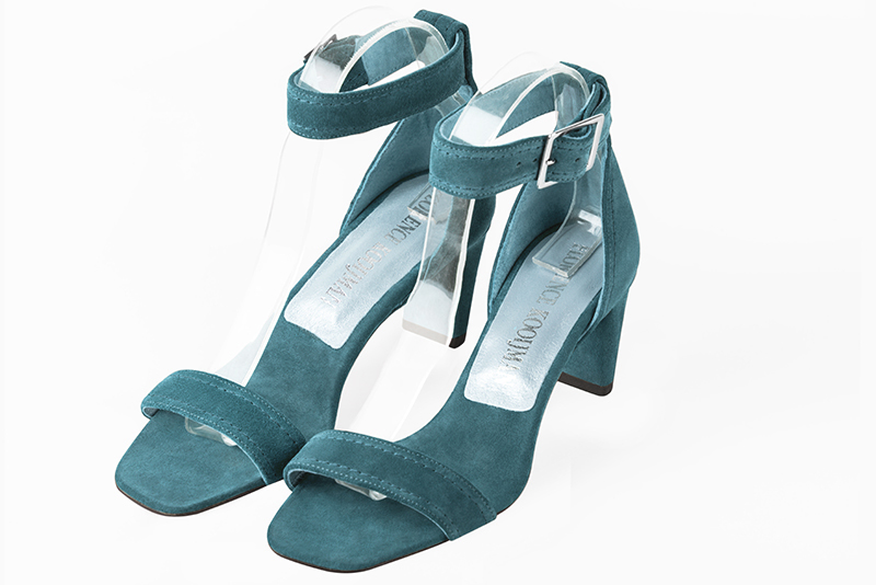Peacock blue women's closed back sandals, with a strap around the ankle. Square toe. Medium comma heels. Front view - Florence KOOIJMAN
