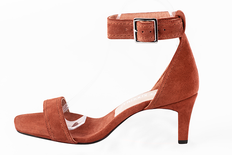 Terracotta orange women's closed back sandals, with a strap around the ankle. Square toe. Medium comma heels. Profile view - Florence KOOIJMAN