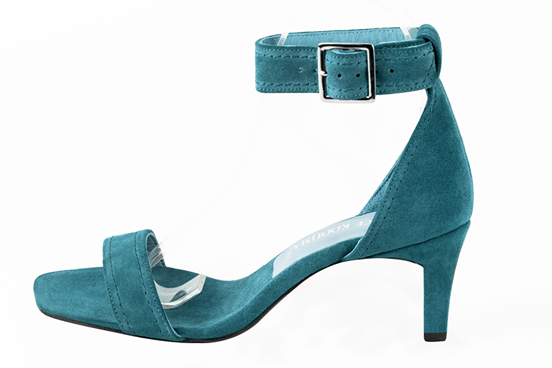 Peacock blue women's closed back sandals, with a strap around the ankle. Square toe. Medium comma heels. Profile view - Florence KOOIJMAN