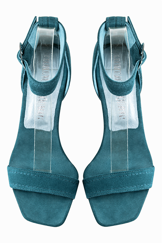 Peacock blue women's closed back sandals, with a strap around the ankle. Square toe. Medium comma heels. Top view - Florence KOOIJMAN