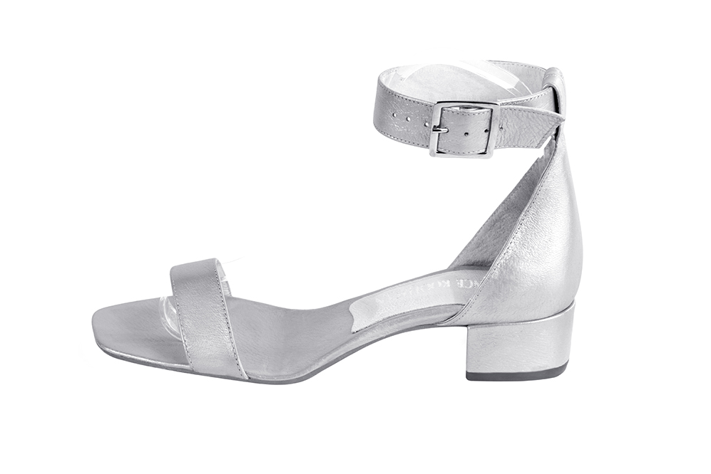 Silver elegant sandals with a strap around the ankle. Square toe. Low block heels. - Florence KOOIJMAN