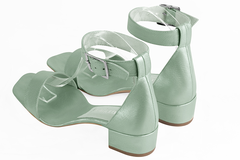 Mint green women's closed back sandals, with a strap around the ankle. Square toe. Low block heels. Rear view - Florence KOOIJMAN