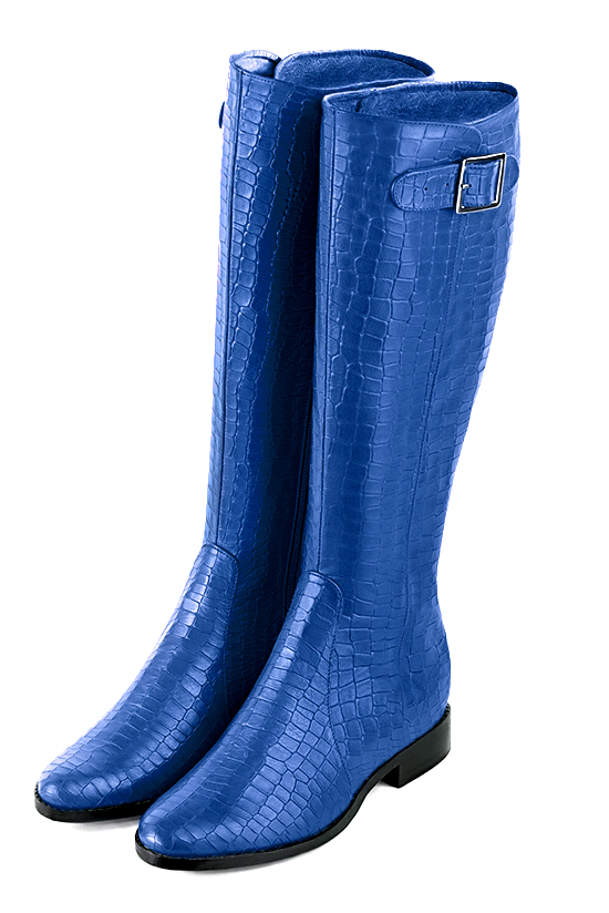 French elegance and refinement for these electric blue knee-high boots with buckles, 
                available in many subtle leather and colour combinations. Record your foot and leg measurements.
We will adjust this beautiful boot with inner half zip to your leg measurements in height and width.
The outer buckle allows for width adjustment.
You can customise the boot with your own materials and colours on the "My Favourites" page.
 
                Made to measure. Especially suited to thin or thick calves.
                Matching clutches for parties, ceremonies and weddings.   
                You can customize these knee-high boots to perfectly match your tastes or needs, and have a unique model.  
                Choice of leathers, colours, knots and heels. 
                Wide range of materials and shades carefully chosen.  
                Rich collection of flat, low, mid and high heels.  
                Small and large shoe sizes - Florence KOOIJMAN