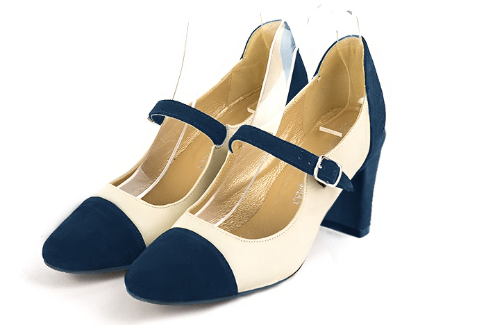 Navy blue and off white women's dress pumps, with a round neckline. Round toe. Medium comma heels. Front view - Florence KOOIJMAN