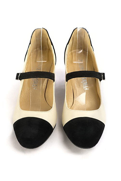 Matt black and off white women's dress pumps, with a round neckline. Round toe. Medium spool heels. Top view - Florence KOOIJMAN