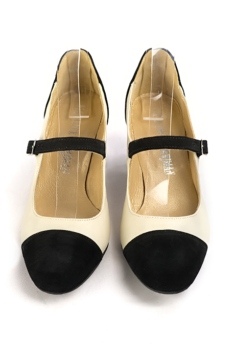 Matt black and off white women's dress pumps, with a round neckline. Round toe. Medium flare heels. Top view - Florence KOOIJMAN