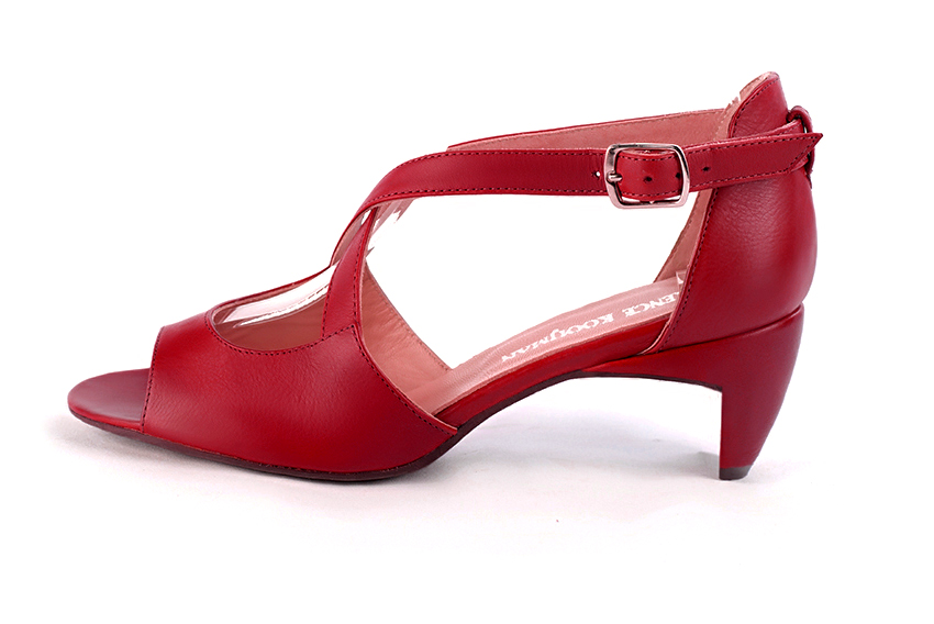 Cardinal red women's closed back sandals, with crossed straps. Round toe. Medium comma heels. Profile view - Florence KOOIJMAN