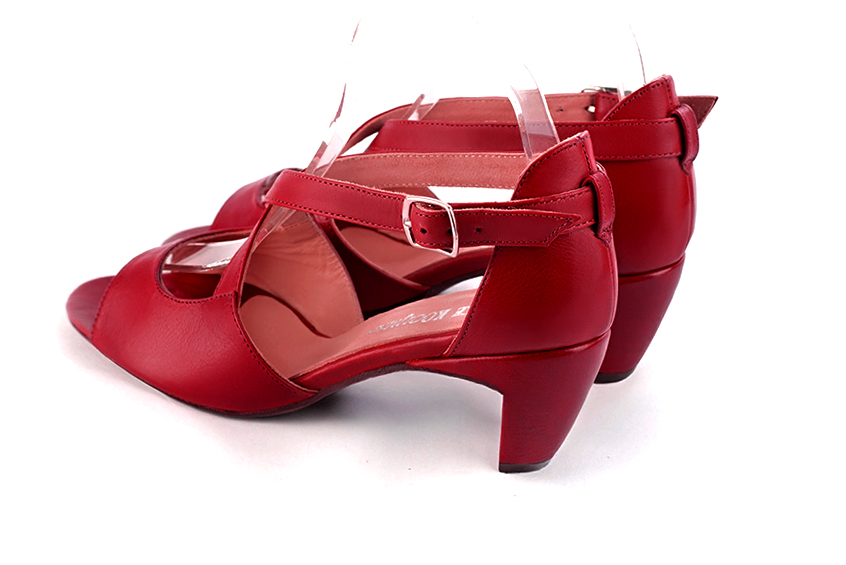 Cardinal red women's closed back sandals, with crossed straps. Round toe. Medium comma heels. Rear view - Florence KOOIJMAN