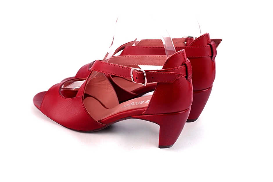 Women's cardinal red elegant sandals closed at the back with crossed straps. Round toe. Medium comma heels - Rear view