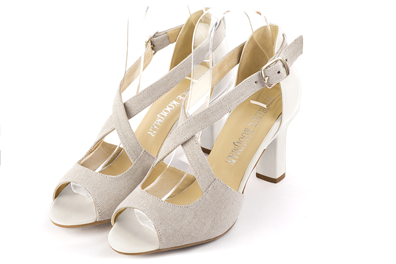 Natural beige and off white women's closed back sandals, with crossed straps. Round toe. High kitten heels. Front view - Florence KOOIJMAN