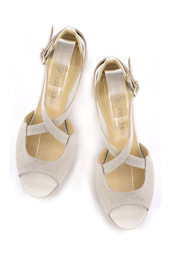 Women's natural beige and off white elegant sandals closed at the back with crossed straps. Round toe. High kitten heels - Top view