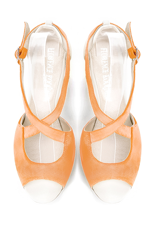 Marigold orange and off white women's closed back sandals, with crossed straps. Round toe. Medium spool heels. Top view - Florence KOOIJMAN