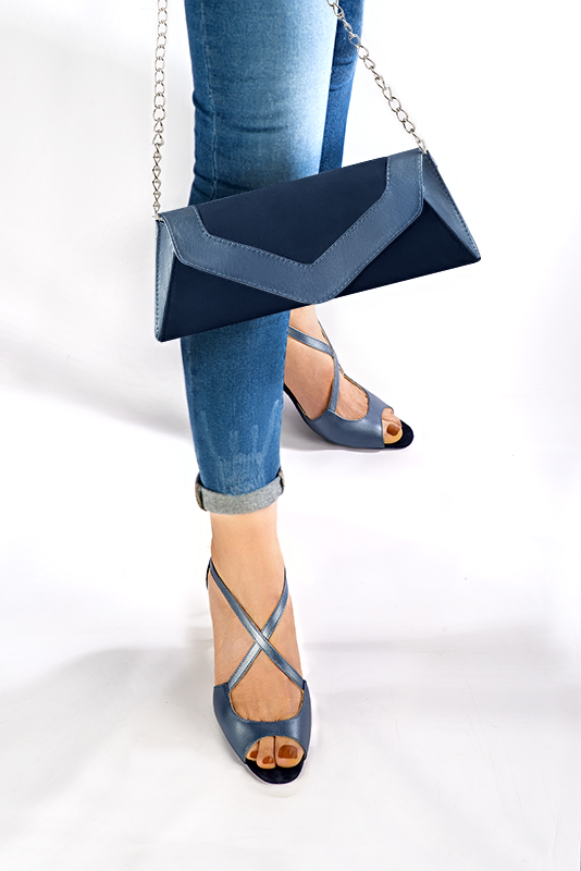 Denim blue women's closed back sandals, with crossed straps. Square toe. High slim heel. Worn view - Florence KOOIJMAN