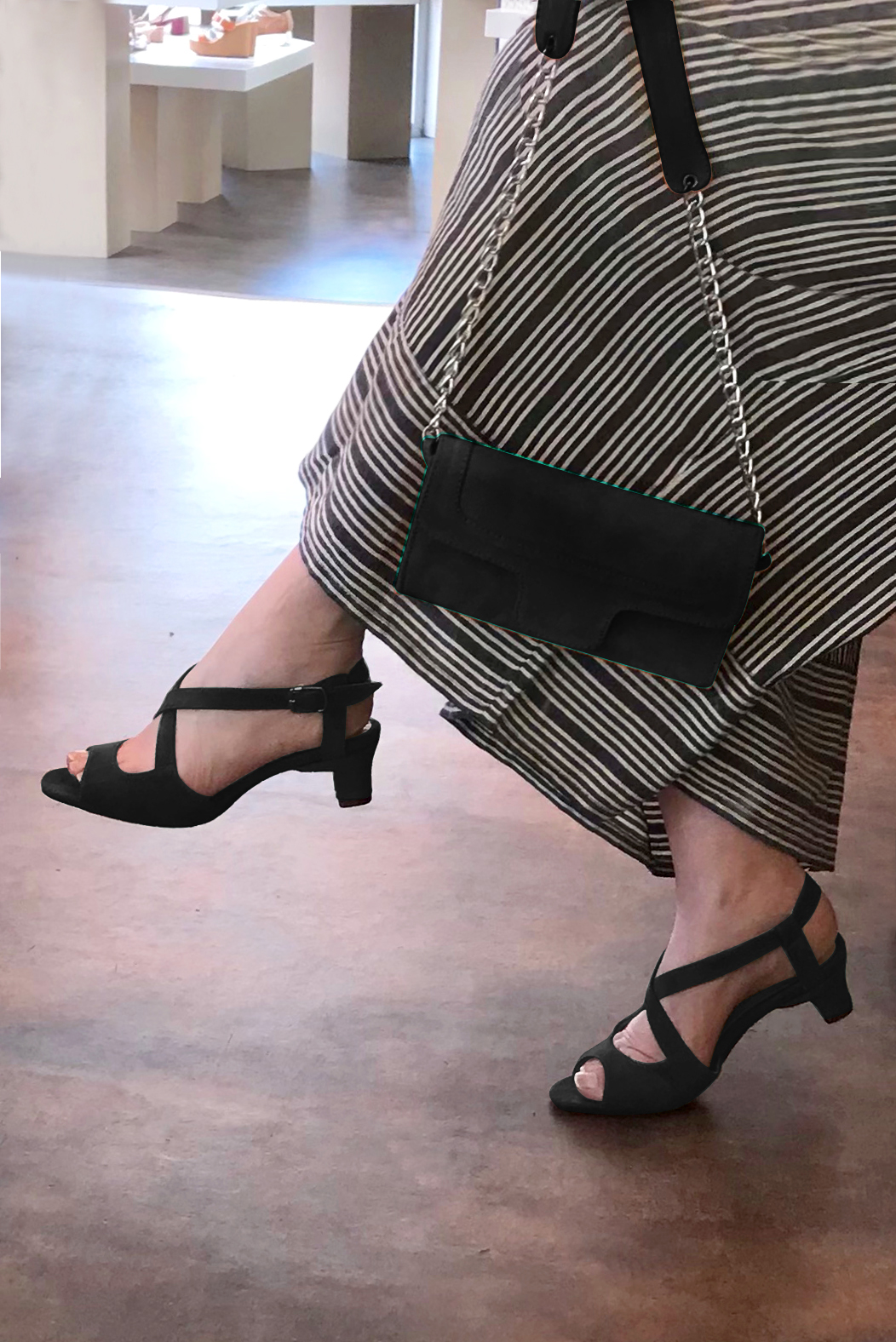 Matt black women's open back sandals, with crossed straps. Round toe. Low kitten heels. Worn view - Florence KOOIJMAN