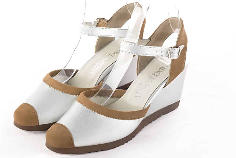 Tan beige and light silver women's open back shoes, with an instep strap. Round toe. Medium wedge heels. Front view - Florence KOOIJMAN