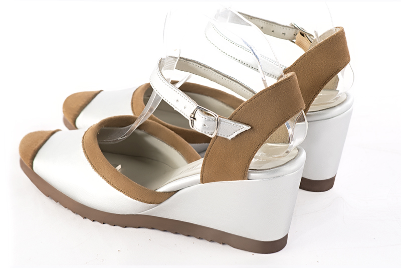 Tan beige and light silver women's open back shoes, with an instep strap. Round toe. Medium wedge heels. Rear view - Florence KOOIJMAN
