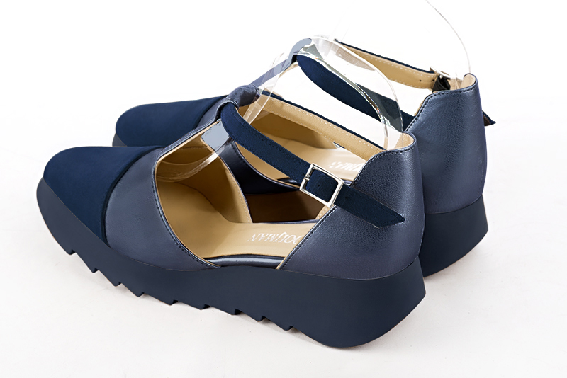 Navy blue women's open side shoes, with an instep strap. Square toe. Low rubber soles. Rear view - Florence KOOIJMAN