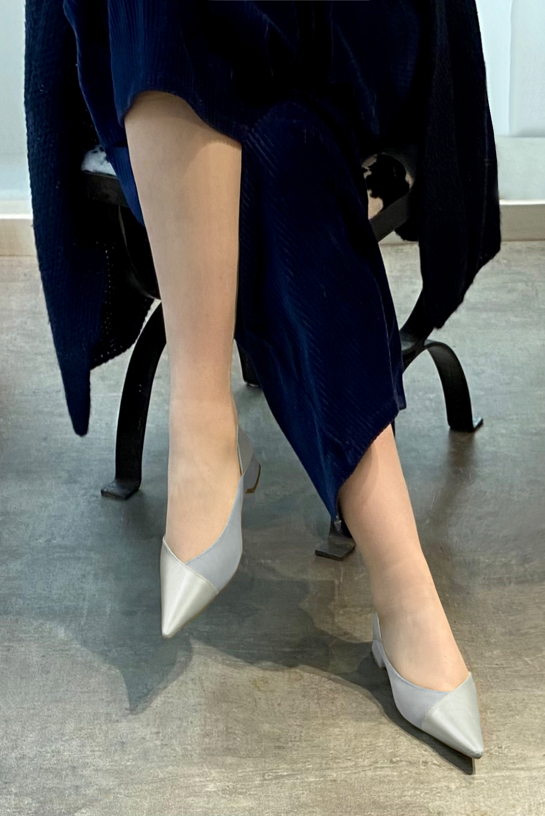 Light silver and pearl grey women's open arch dress pumps. Pointed toe. Flat flare heels. Worn view - Florence KOOIJMAN