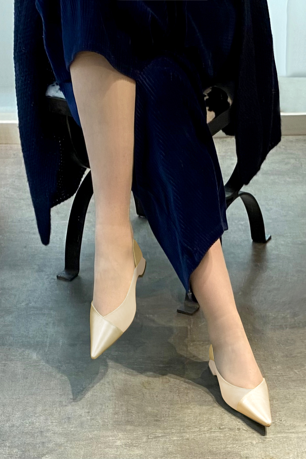 Gold and champagne beige women's open arch dress pumps. Pointed toe. Flat flare heels. Worn view - Florence KOOIJMAN