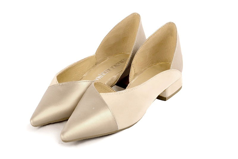 Gold and champagne beige women's open arch dress pumps. Pointed toe. Flat flare heels. Front view - Florence KOOIJMAN