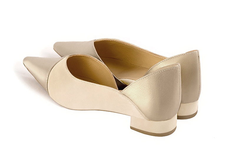 Gold and champagne beige women's open arch dress pumps. Pointed toe. Flat flare heels. Rear view - Florence KOOIJMAN