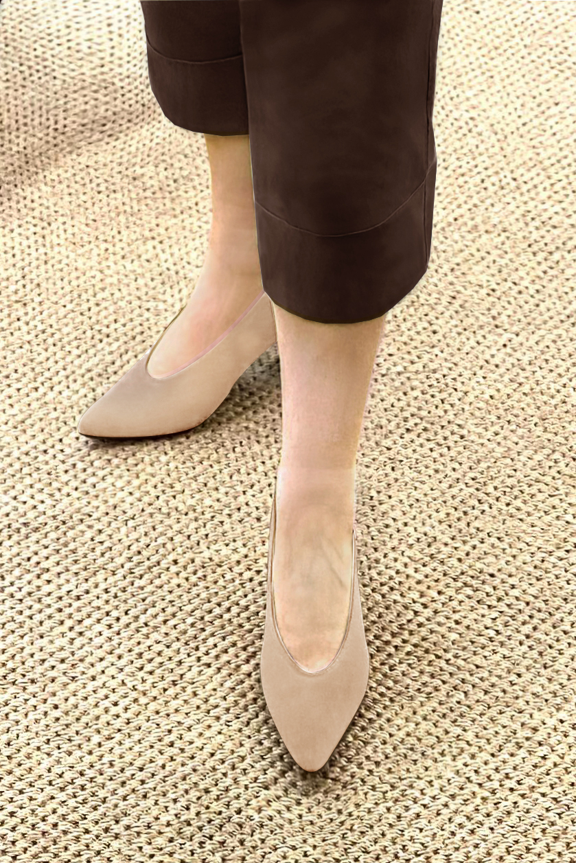 Tan beige women's dress pumps, with a round neckline. Tapered toe. Medium comma heels. Worn view - Florence KOOIJMAN
