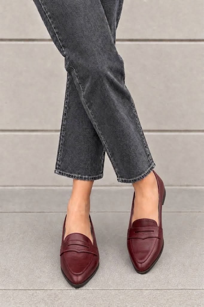 Women's burgundy classic penny loafers with almond toe and chunky rubber lug sole - Worn view