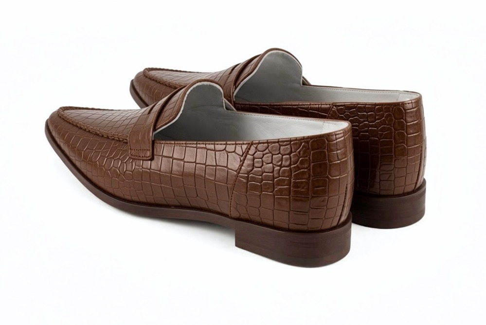 Women's cognac classic penny loafers with almond toe and chunky rubber lug sole - Rear view