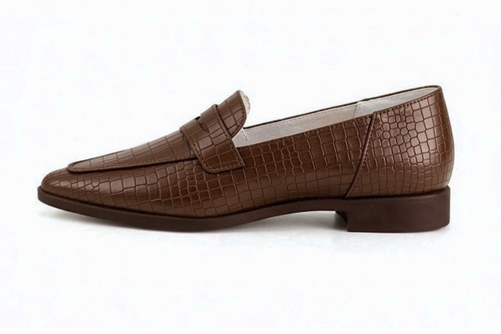 Timeless women's loafers crafted in smooth calfskin, offering clean silhouettes and effortless sophistication for work 
                    and casual wear, in cognac leather with almond toe and chunky rubber lug sole - Florence KOOIJMAN