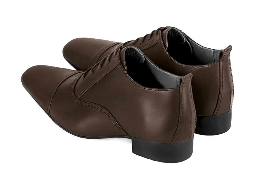 Dark brown lace-up dress shoes for men. Round toe. Flat leather soles. Rear view - Florence KOOIJMAN