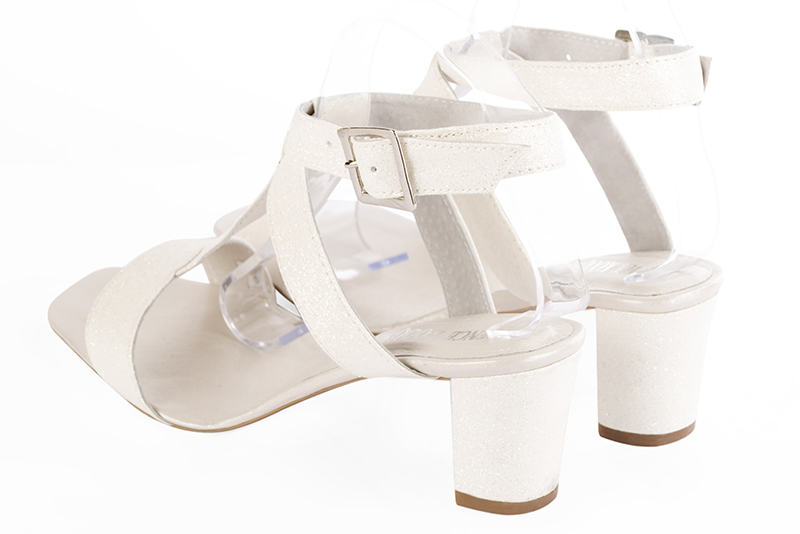 Off white women's fully open sandals, with an instep strap. Square toe. Medium block heels. Rear view - Florence KOOIJMAN