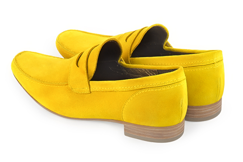 Yellow dress loafers for men. Round toe. Flat leather soles. Rear view - Florence KOOIJMAN