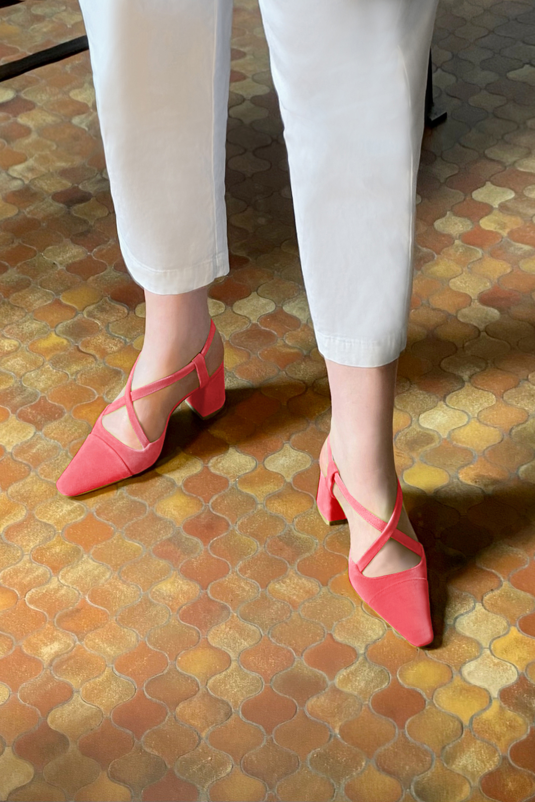 Carnation pink women's open back shoes, with crossed straps. Tapered toe. Medium flare heels. Worn view - Florence KOOIJMAN