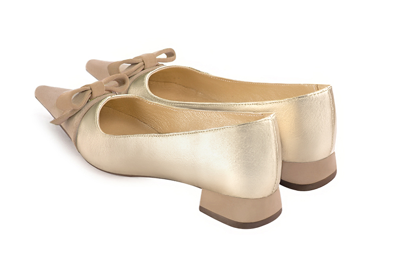 Tan beige and gold women's ballet pumps, with low heels. Pointed toe. Flat flare heels. Rear view - Florence KOOIJMAN