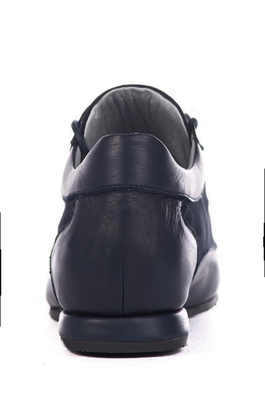 Navy blue women's one-tone elegant sneakers. Round toe. Flat wedge soles. Worn view - Florence KOOIJMAN