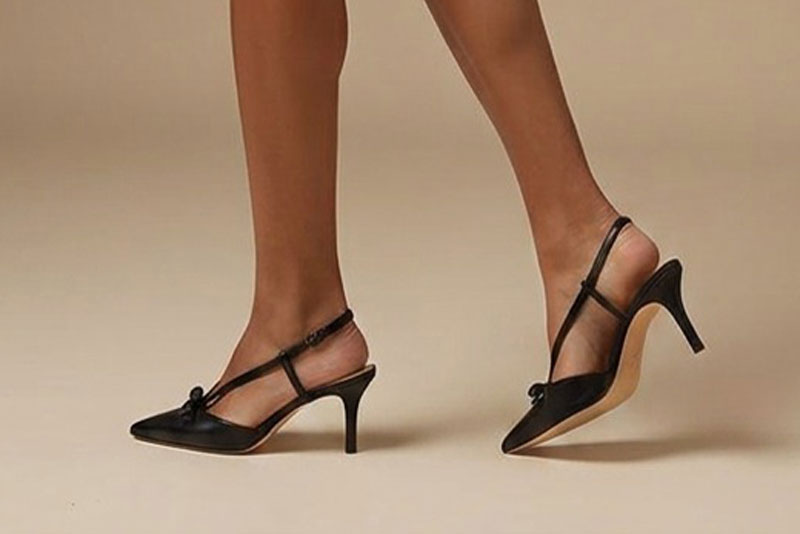 Dress slingback heels in satin black leather with high slim heels and pointed toe - Rear view