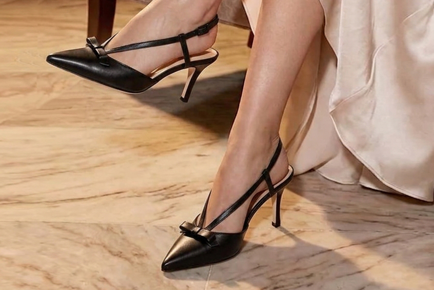 Dress slingback heels in satin black leather with medium slim heels and pointed toe - Rear view