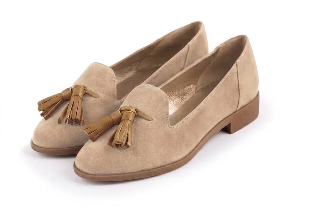 Women's nude and camel tassel loafers with round toe and chunky rubber lug sole - Front view