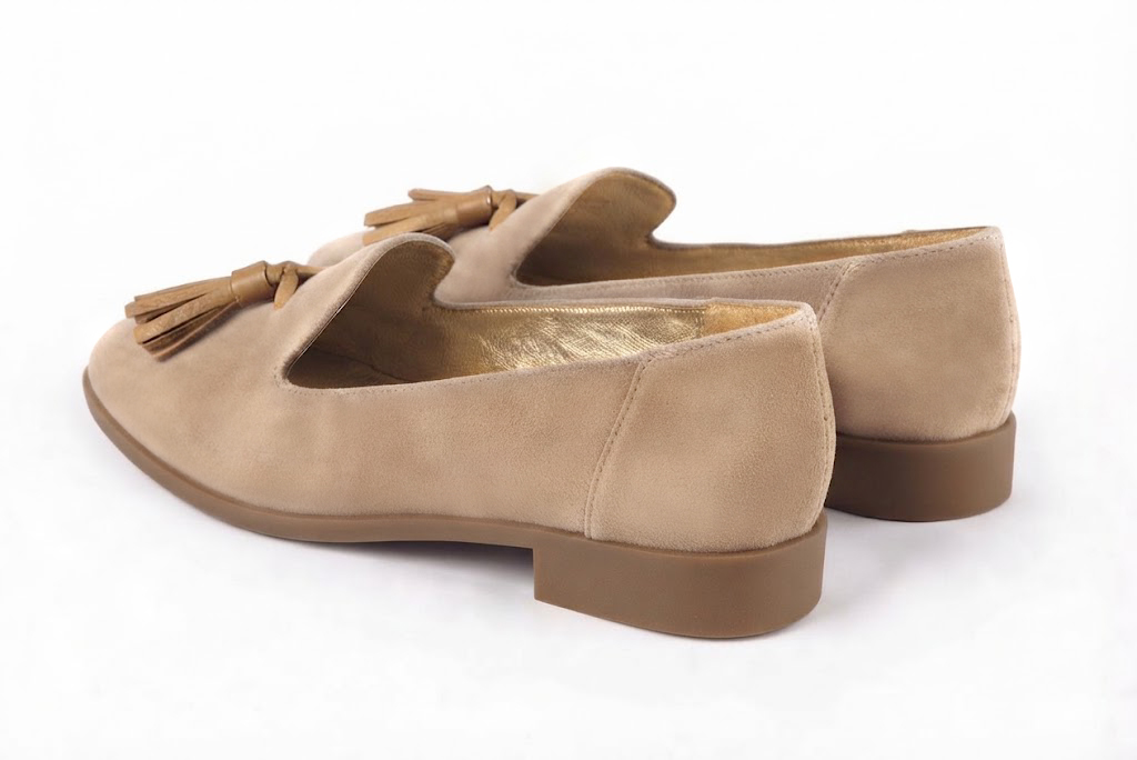 Women's nude and camel tassel loafers with round toe and chunky rubber lug sole - Rear view