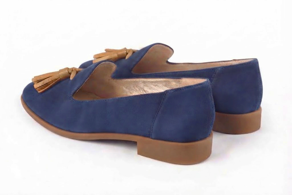 Women's indigo blue and camel tassel loafers with round toe and chunky rubber lug sole - Rear view