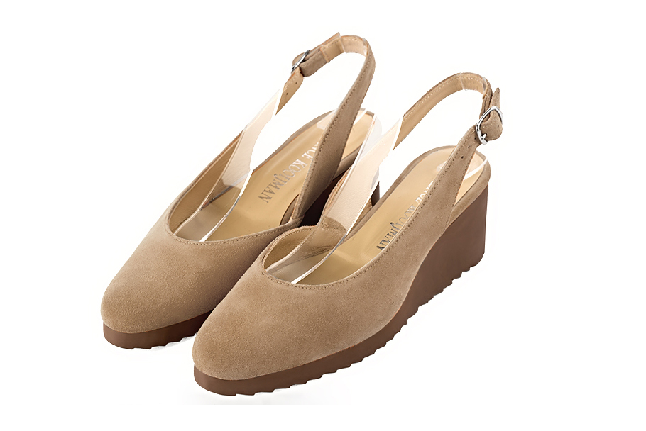 Tan beige slingback elegant shoes. Round toe. Thick rubber soles.