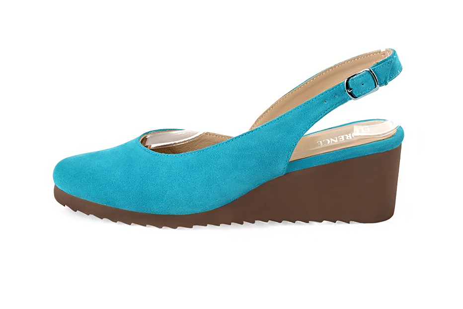 French elegance and refinement for these turquoise blue dress slingback shoes, 
                available in many subtle leather and colour combinations.   
                Matching clutches for parties, ceremonies and weddings.   
                You can customize these shoes to perfectly match your tastes or needs, and have a unique model.  
                Choice of leathers, colours, knots and heels. 
                Wide range of materials and shades carefully chosen.  
                Rich collection of flat, low, mid and high heels.  
                Small and large shoe sizes - Florence KOOIJMAN