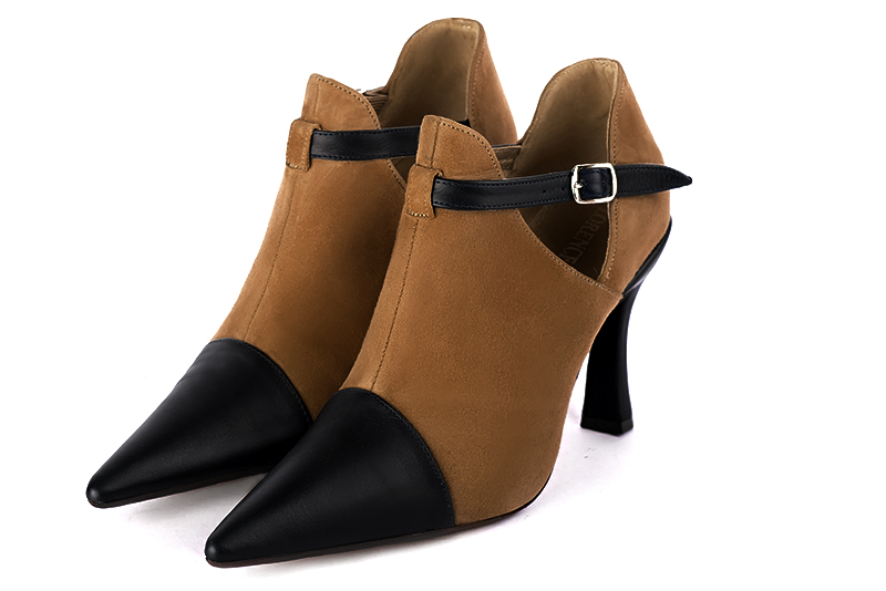 Women's satin black and caramel brown elegant ankle boots, with buckles on the sides. Pointed toe. High spool heels - Front view