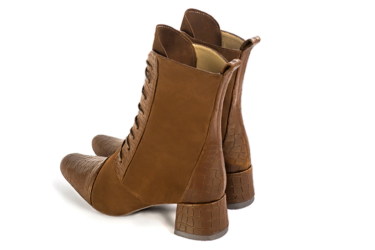 Caramel brown women's ankle boots with laces at the front. Round toe. Low flare heels. Rear view - Florence KOOIJMAN