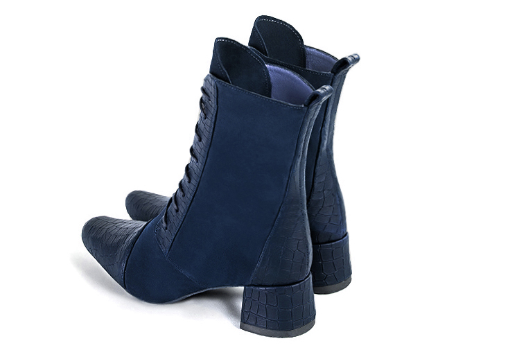 Navy blue women's ankle boots with laces at the front. Round toe. Low flare heels. Rear view - Florence KOOIJMAN