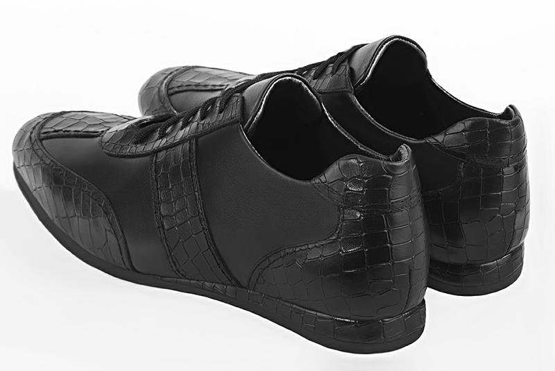 Satin black one-tone dress sneakers for men. Round toe. Flat rubber soles. Rear view - Florence KOOIJMAN